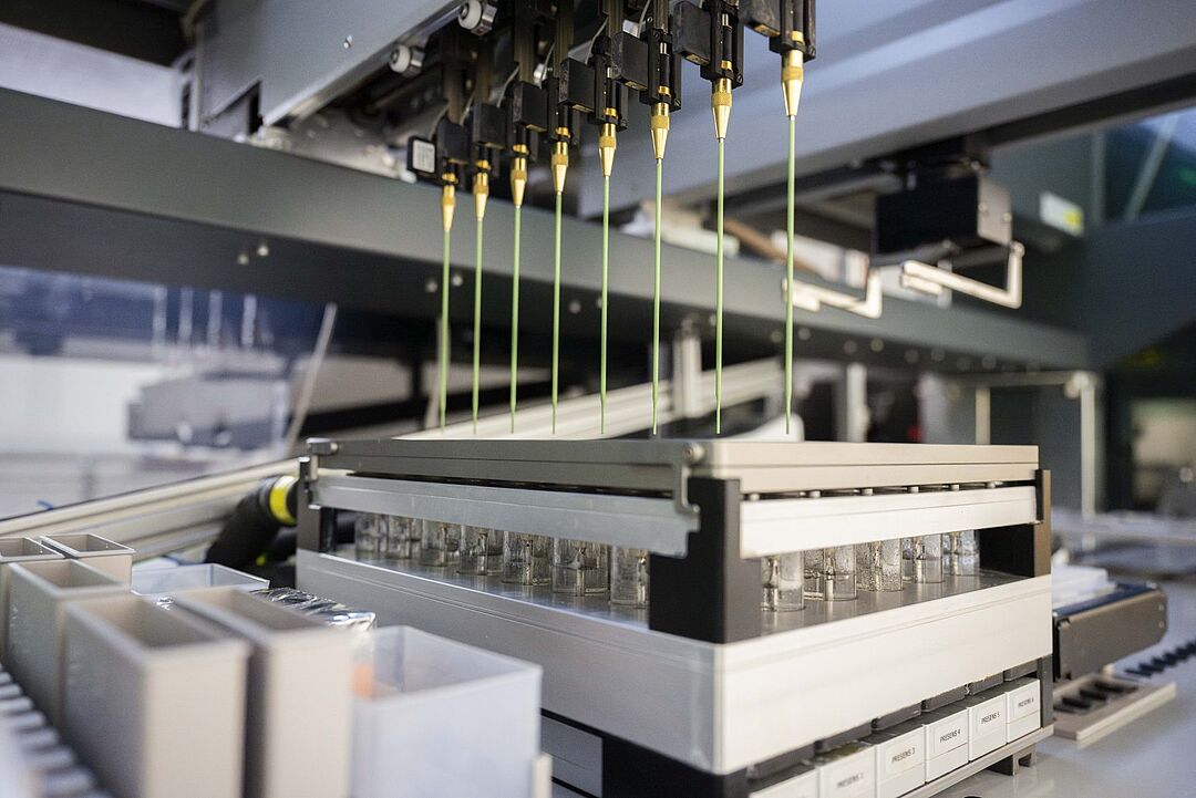 An automated pipetting robot above parallel bioreactors in the KIWI Biolab
